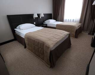 Отель Hotel Home Parq Экибастуз Стандартный двухместный номер с 2 отдельными кроватями-1